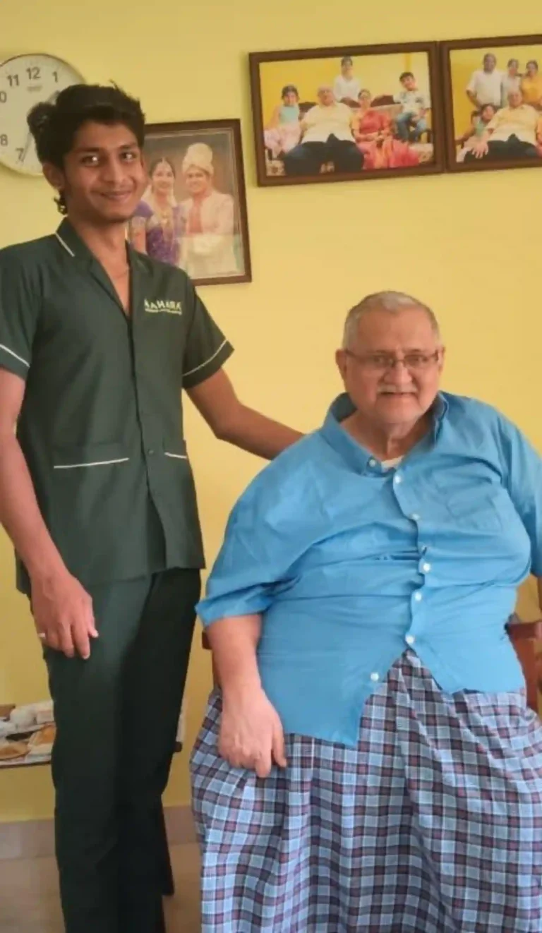 Mahara caregiver supporting an elderly man at home