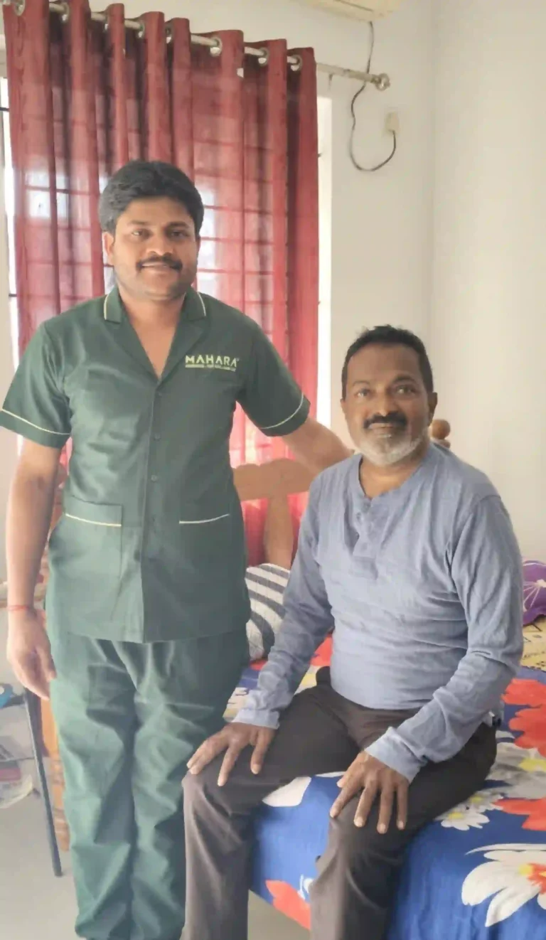 Mahara home male nurse with an elderly woman.