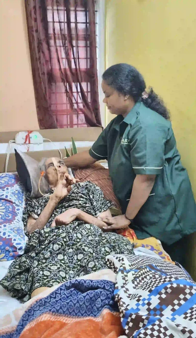 Mahara home nurse assisting a bedridden patient