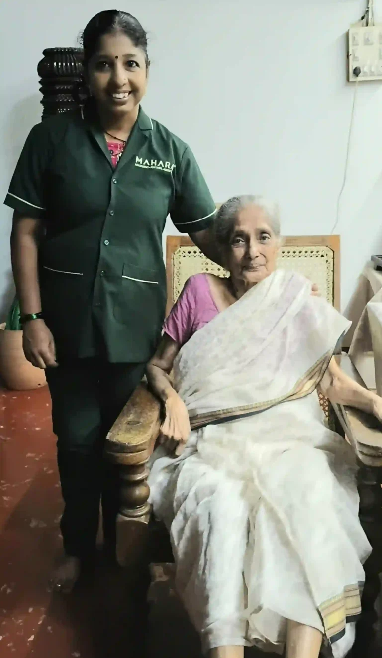 Mahara home nurse standing next to an elderly woman